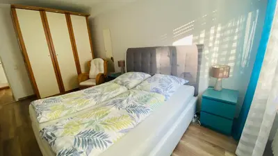 Ein Bett oder Betten in einem Zimmer der Unterkunft Ferienwohnung Koko