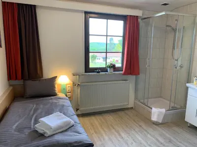 Ein Badezimmer in der Unterkunft Ruhrpottpension Am Stöter