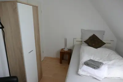 Ein Bett oder Betten in einem Zimmer der Unterkunft kleine Ferienwohnung am Wulfkamp