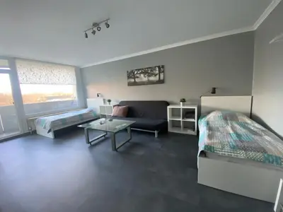 Ein Bett oder Betten in einem Zimmer der Unterkunft 1 A Ferienwohnung Modern Duisburg