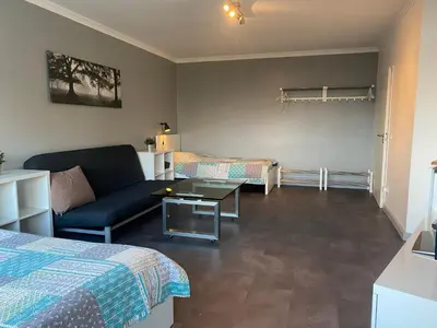 Ein Bett oder Betten in einem Zimmer der Unterkunft 1 A Ferienwohnung Modern Duisburg