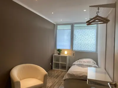 Ein Bett oder Betten in einem Zimmer der Unterkunft 3 Zimmer Apartment Duisburg Homberg 7 Etage