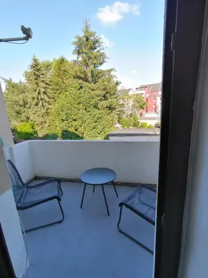 Ein Balkon oder eine Terrasse in der Unterkunft Ferienwohnung 14.sechs - Jahrhundertwende trifft Moderne