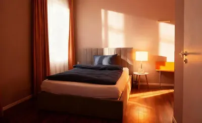 Ein Bett oder Betten in einem Zimmer der Unterkunft Hotel Ambiente