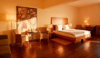 Ein Bett oder Betten in einem Zimmer der Unterkunft Hotel Ambiente