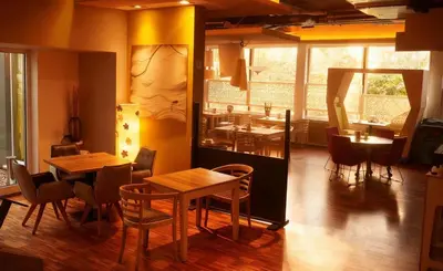 Ein Restaurant oder anderes Speiselokal in der Unterkunft Hotel Ambiente