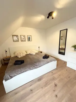 Ein Bett oder Betten in einem Zimmer der Unterkunft Große Apartments für Monteure - Dorsten -