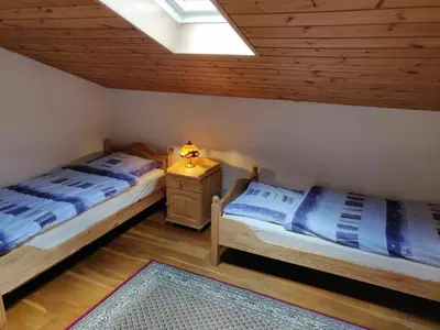 Ein Bett oder Betten in einem Zimmer der Unterkunft Zur alten Schmiede