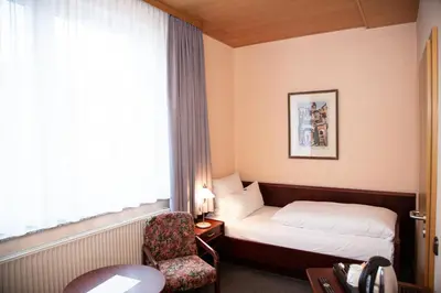 Ein Bett oder Betten in einem Zimmer der Unterkunft Hotel Lonac