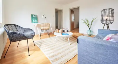 Ein Sitzbereich in der Unterkunft interaktiv Appartements in Heiligenhaus - Hauptstrasse