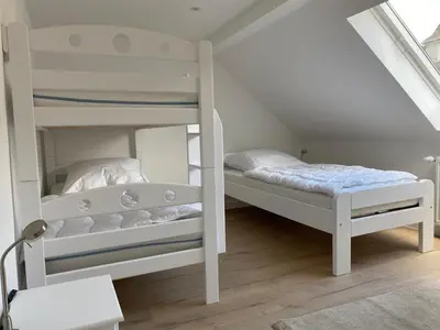 Ein Bett oder Betten in einem Zimmer der Unterkunft interaktiv Appartements in Heiligenhaus - Hauptstrasse