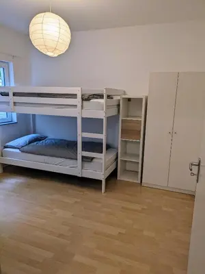 Ein Bett oder Betten in einem Zimmer der Unterkunft interaktiv Appartements in Ratingen - Düsseldorferstrasse