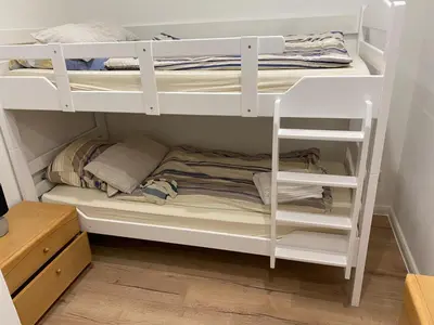 Ein Etagenbett oder Etagenbetten in einem Zimmer der Unterkunft interaktiv Appartements in Ratingen - Düsseldorferstrasse