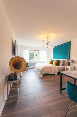 Ein Bett oder Betten in einem Zimmer der Unterkunft GATSBY Apartment