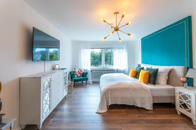Ein Bett oder Betten in einem Zimmer der Unterkunft GATSBY Apartment