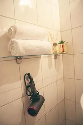 Ein Badezimmer in der Unterkunft GATSBY Apartment