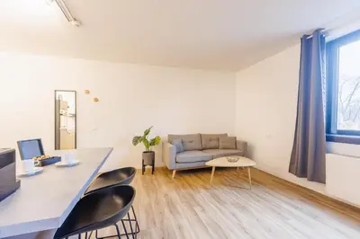 Ein Sitzbereich in der Unterkunft Glück Auf Appartements Düppelstraße