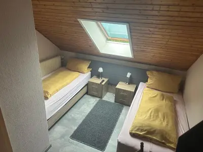 Ein Bett oder Betten in einem Zimmer der Unterkunft Hotel-Restaurant Olympia
