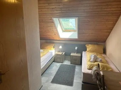 Ein Bett oder Betten in einem Zimmer der Unterkunft Hotel-Restaurant Olympia