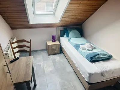 Ein Bett oder Betten in einem Zimmer der Unterkunft Hotel-Restaurant Olympia