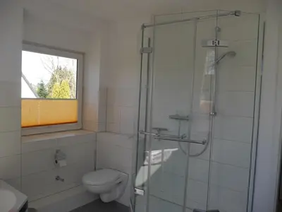Ein Badezimmer in der Unterkunft FeWo BlumenPott