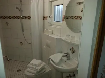 Ein Badezimmer in der Unterkunft Hotel Am Kamin