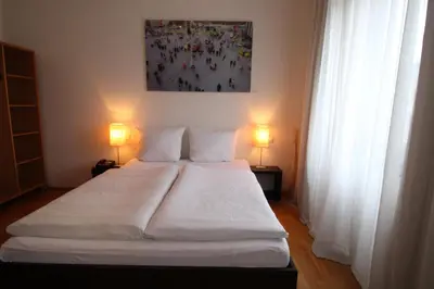 Ein Bett oder Betten in einem Zimmer der Unterkunft Hotel Lorenz