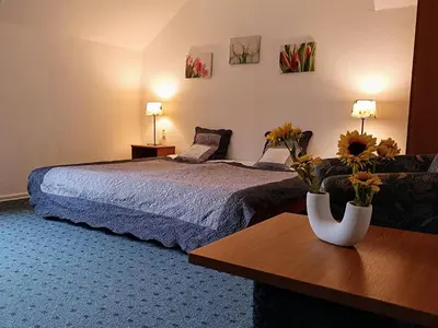 Ein Bett oder Betten in einem Zimmer der Unterkunft Waldhotel Unterbach