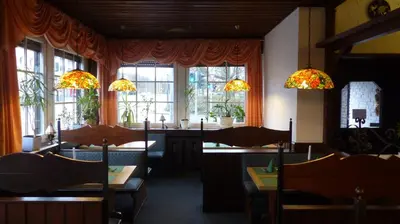 Ein Sitzbereich in der Unterkunft Hotel Dümptener Hof