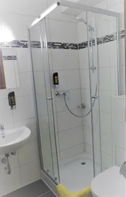Ein Badezimmer in der Unterkunft Hotel Dümptener Hof