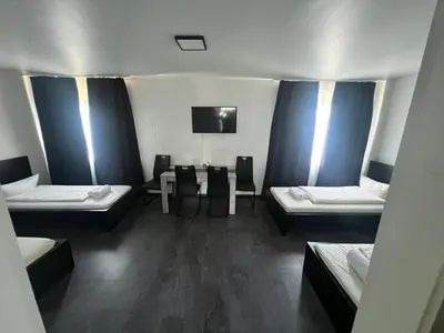 Ein Bett oder Betten in einem Zimmer der Unterkunft Hotel Dümptener Hof