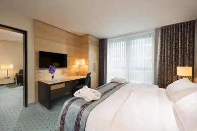 Ein Bett oder Betten in einem Zimmer der Unterkunft Maritim Hotel Düsseldorf