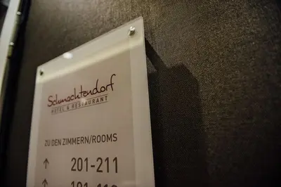 Ein Zertifikat, Auszeichnung, Logo oder anderes Dokument, das in der Unterkunft Hotel Schmachtendorf ausgestellt ist