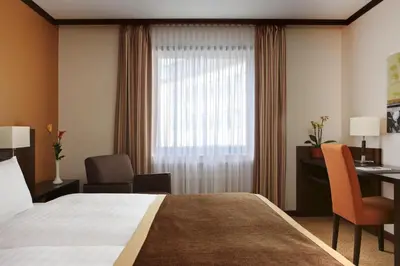Ein Bett oder Betten in einem Zimmer der Unterkunft Steigenberger Dortmund