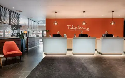 Ein Zertifikat, Auszeichnung, Logo oder anderes Dokument, das in der Unterkunft Tulip Inn Hotel Düsseldorf Arena - 2 Minuten Fußweg zur Messe ausgestellt ist
