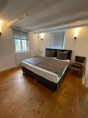 Ein Bett oder Betten in einem Zimmer der Unterkunft Haus Mees Appartements