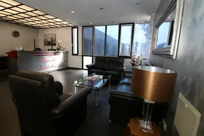 Ein Sitzbereich in der Unterkunft Concorde Hotel Ascot