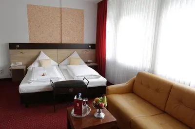 Ein Bett oder Betten in einem Zimmer der Unterkunft Hotel Cascade Superior