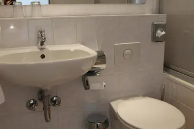 Ein Badezimmer in der Unterkunft Hotel Weidenhof
