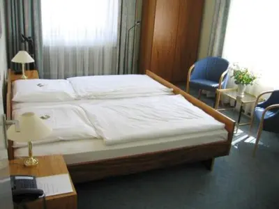 Ein Bett oder Betten in einem Zimmer der Unterkunft Gildenhof An den Westfalenhallen Dortmund