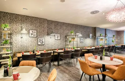 Ein Restaurant oder anderes Speiselokal in der Unterkunft Leonardo Boutique Hotel Düsseldorf