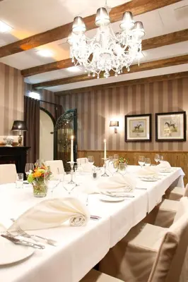 Ein Restaurant oder anderes Speiselokal in der Unterkunft Parkhotel Wittekindshof