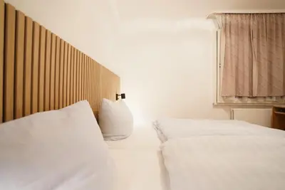 Ein Bett oder Betten in einem Zimmer der Unterkunft Hotel Solinger Hof