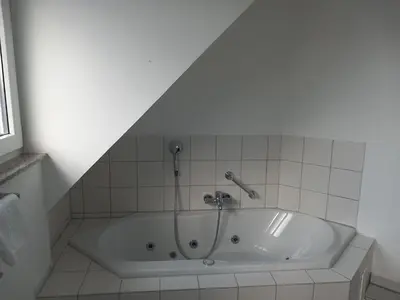 Ein Badezimmer in der Unterkunft Stadthotel Reckers