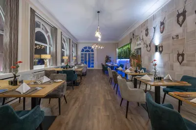 Ein Restaurant oder anderes Speiselokal in der Unterkunft Fletcher Waldhotel Nordrhein-Westfalen