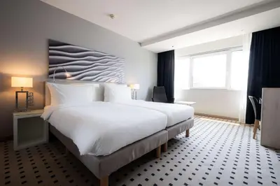 Ein Bett oder Betten in einem Zimmer der Unterkunft Radisson Blu Conference Hotel, Düsseldorf