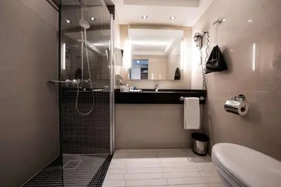 Ein Badezimmer in der Unterkunft Radisson Blu Conference Hotel, Düsseldorf