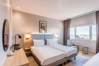 Ein Bett oder Betten in einem Zimmer der Unterkunft Radisson Blu Conference Hotel, Düsseldorf
