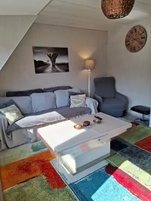 Ein Sitzbereich in der Unterkunft Ferienwohnung am Stadion Bochum Grumme