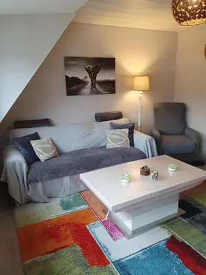 Ein Sitzbereich in der Unterkunft Ferienwohnung am Stadion Bochum Grumme